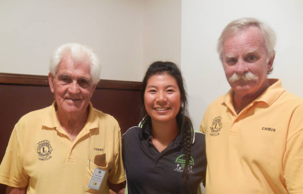 Grenfell Lions Club Festival Queen Entrant May Suzuki with Secretary Terry Carroll and President Chris Moran. 