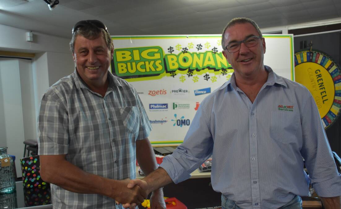 Mark Troth (R) manager of Grenfell AGnVET with Graeme Martin at the Big Bucks Bonanza held recently at the Grenfell Country Club.