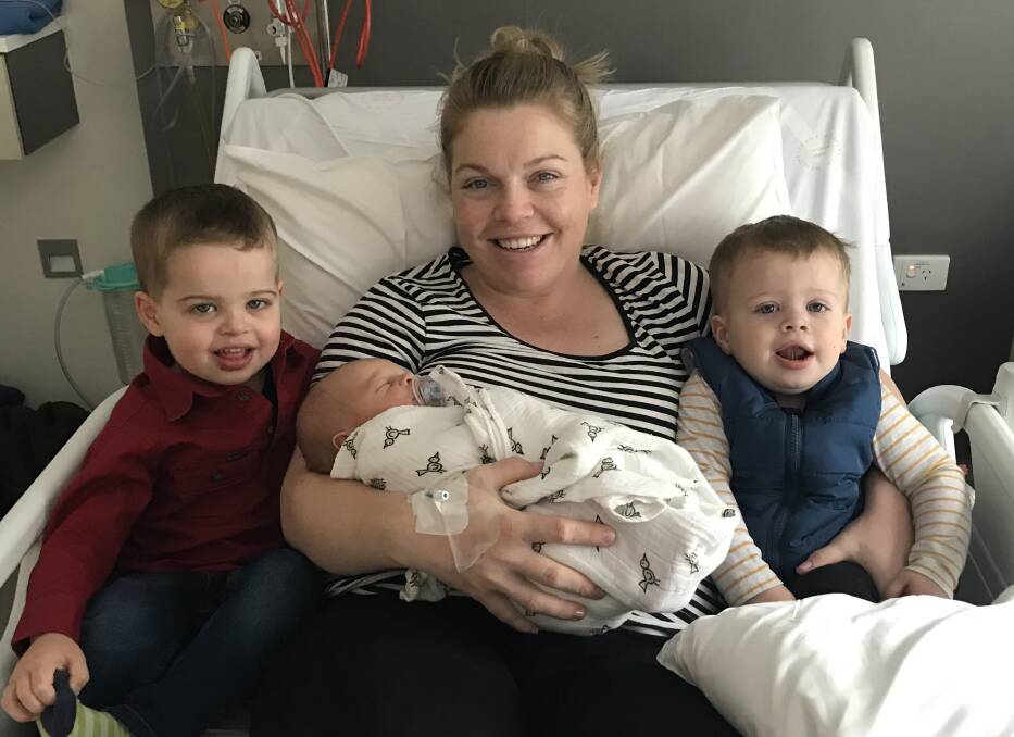 New born Billy Essex with his mother Emily and big brothers Max and Eddie. (Cont)