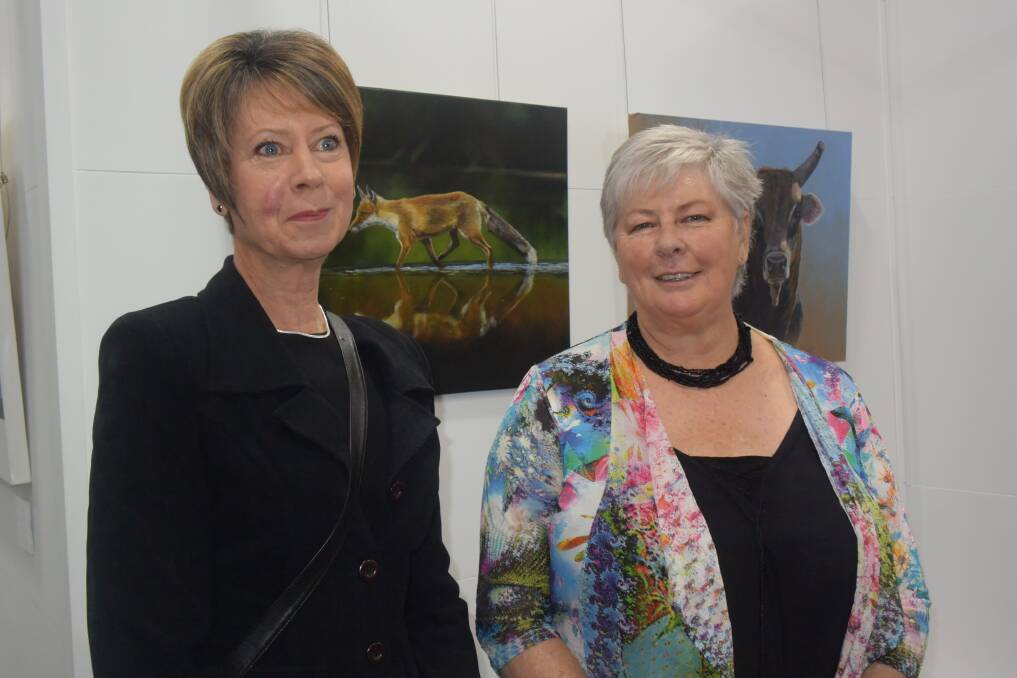 ARTISTS: Louise Adams and Ann Gilbert during the official opening of their current Grenfell Art Gallery exhibition titled 'Through Different Eyes'.