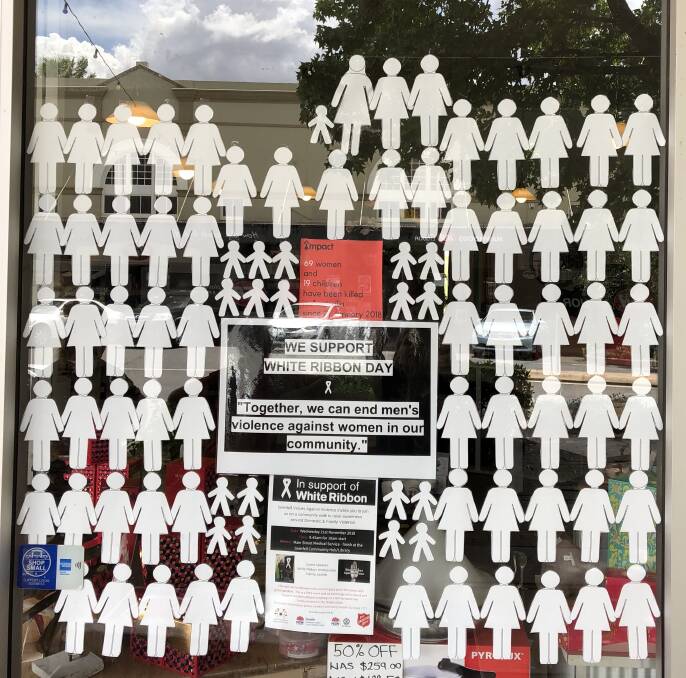 The excellent White Ribbon display in the window of The Tin Cupboard in Grenfell's Main Street, opposite IGA supermarket.  