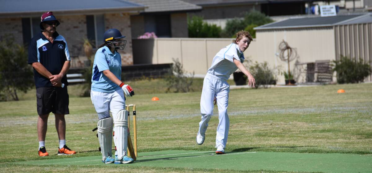 JUNIOR CRICKET: Eels bowler Zac Simpson pelts one to Breakers' Oscar Schaefer in the round three match at Lawson oval.