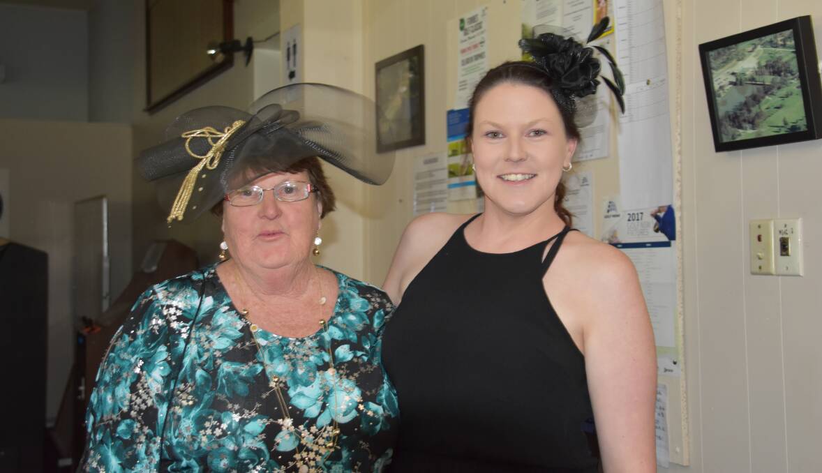 Mother and daughter Glenice O'Connor and Maureen Johnson at the Red Cross Melbourne Cup Day luncheon at the Country Club on Tuesday, November 7.