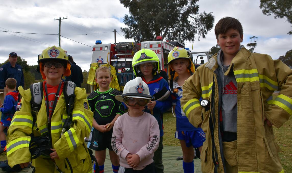 Children at the Junior Rugby League at Lawson Park last Saturday got a taste of being a fire fighter. 