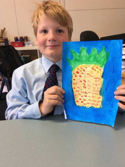 Henry Clifton with his Ken Done style art. Photo St Joseph's Primary School.