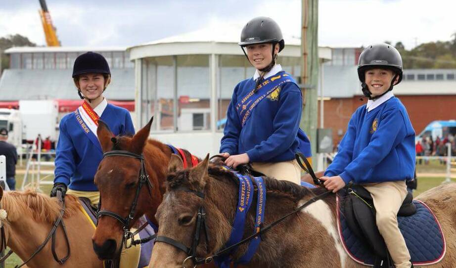 GRENFELL PONY CLUB: Lily Vardy with Emily and Trent Beath-Pearce at the Grenfell Show. Photo GPC