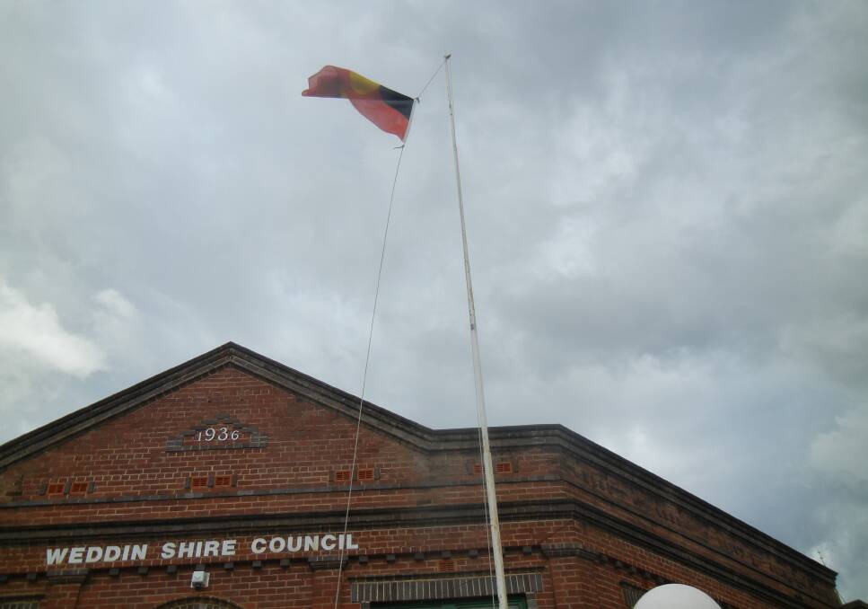 The Aboriginal flag flying proudly at Council Chambers for NAIDOC Week.