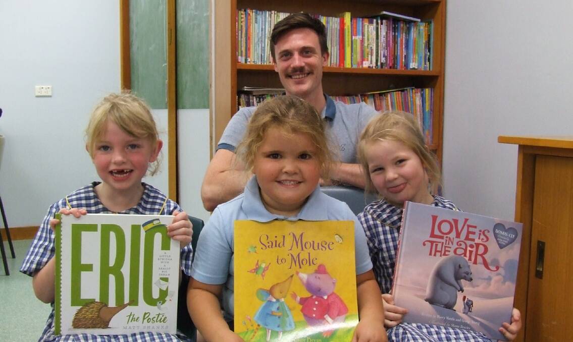 Quandialla Primary School's 2019 kindergarten students are Kate Johnston, Storm McKay and Alexiah Daley-Lahay with K12 teacher Mr Ben Ferris. Photo QPS 