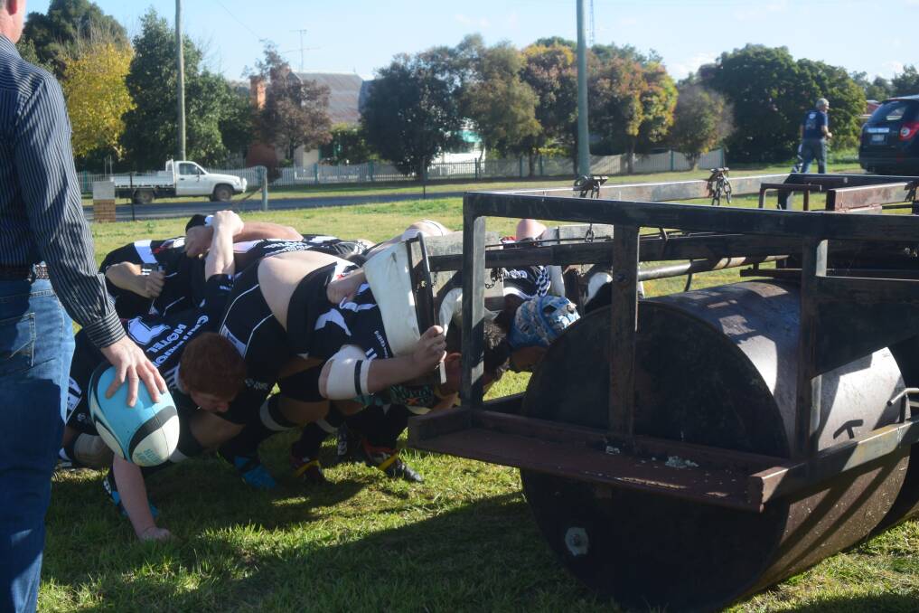 The Grenfell Panthers are busy preparing for a big clash using this scrum training machine, with coach Craig Bembrick.
