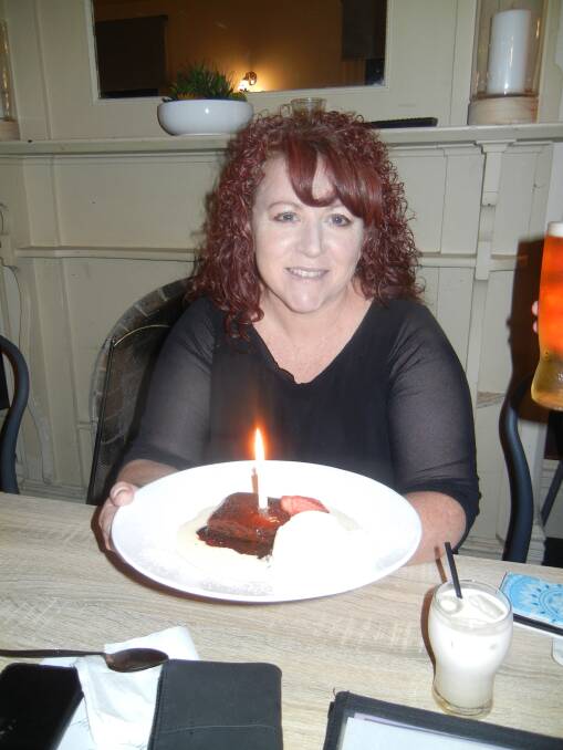 Carolyn Shaw enjoying a special dessert on her special birthday. 