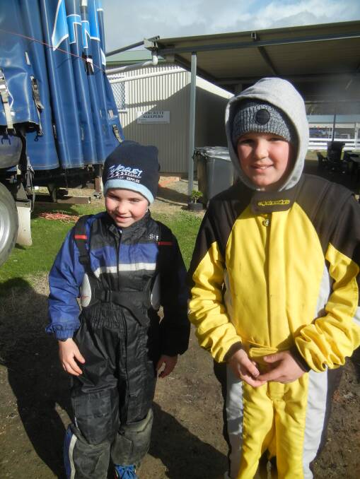 Keeping warm at last weekend's Bob Hinde Memorial are Oscar Savic, 8, from Wollongong and Jedd Rigley, 7, from Dubbo.