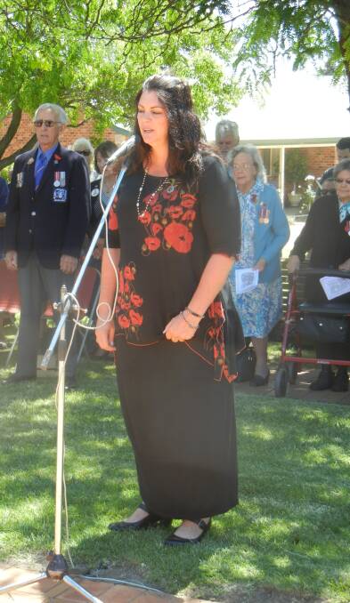 Weddin Shire Councillor Carly Brown sings Advance Australia Fair.