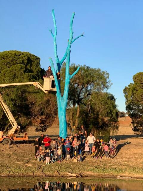 Friends of the late Tom Logan following the painting of their Blue Tree Project (Cont) 