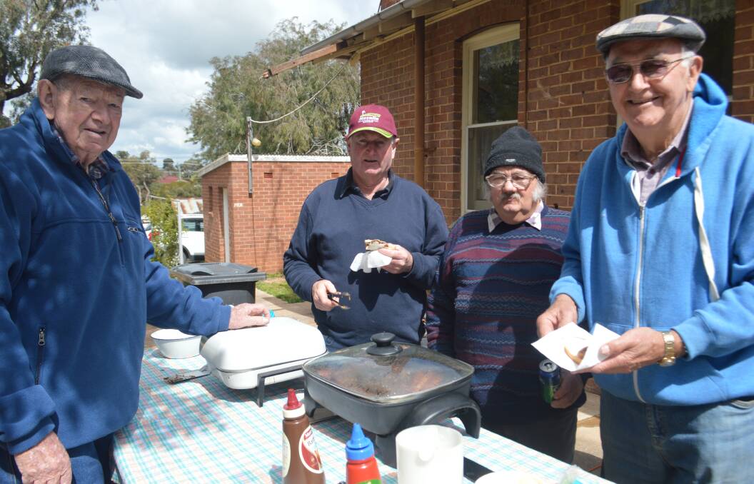 Meat the Men! John Fanning, Kim Whitechurch, Peter Lotherington and Keith Brus at the Anglican fete. 