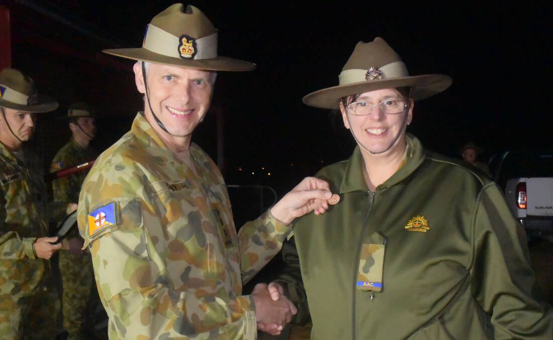 Unit Assistant Sharron Suitor-Clark was presented with a Brigade Commander's Commendation. 