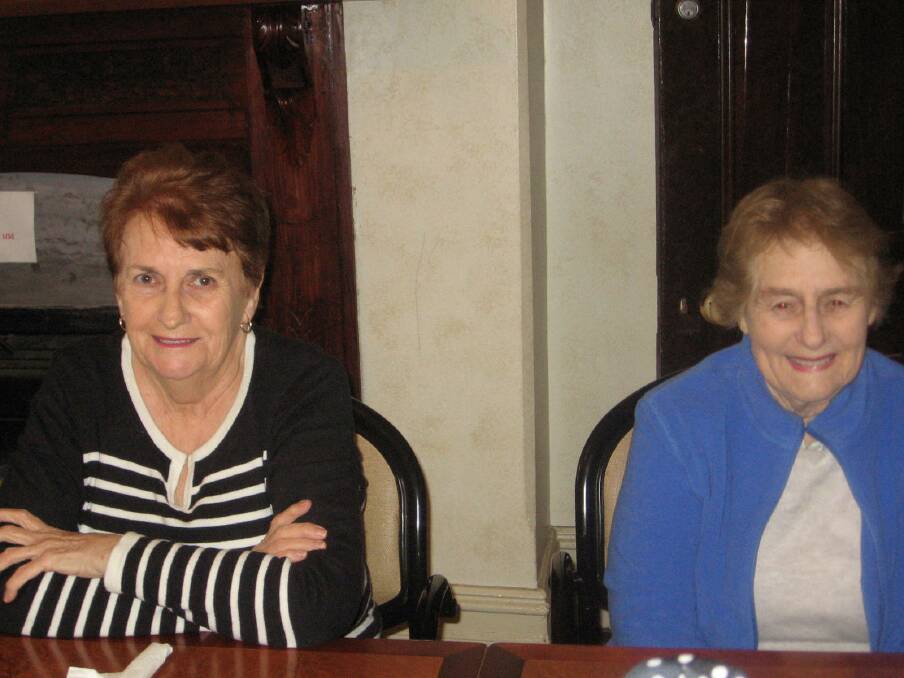 Jacqui Ryan and Pam Pearce enjoy the Neighbour Aid August luncheon last Thursday at the Albion Hotel. 