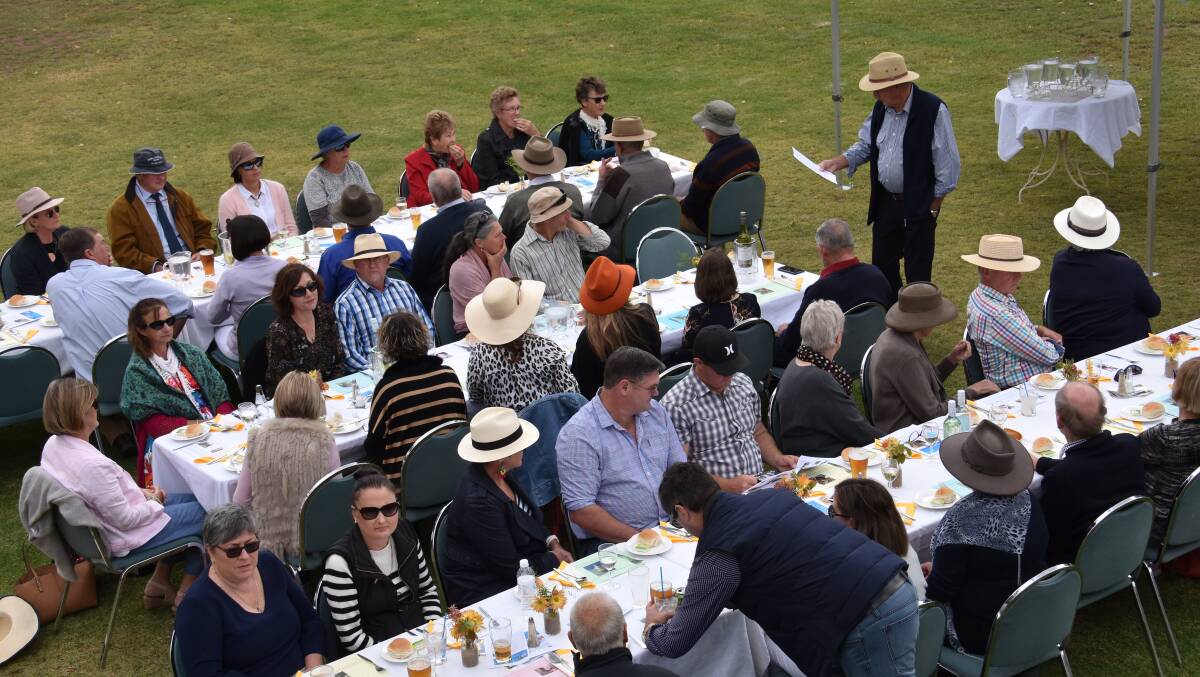 President of the Grenfell Country Education Foundation, Peter Spedding, addresses the large crowd at the 'Lunch on the Lawn' event.
