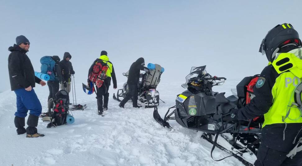 The police alpine operations team loading up the hikers to bring them back after the rescue on Tuesday. Picture: NSW Police 