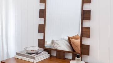 DIY guru Geneva Vanderzeil recently tackled an easy mirror project using Bunnings' Estilo mirror and some stained hobby wood, creating an impressive but affordable statement piece for her bedroom. Picture supplied 