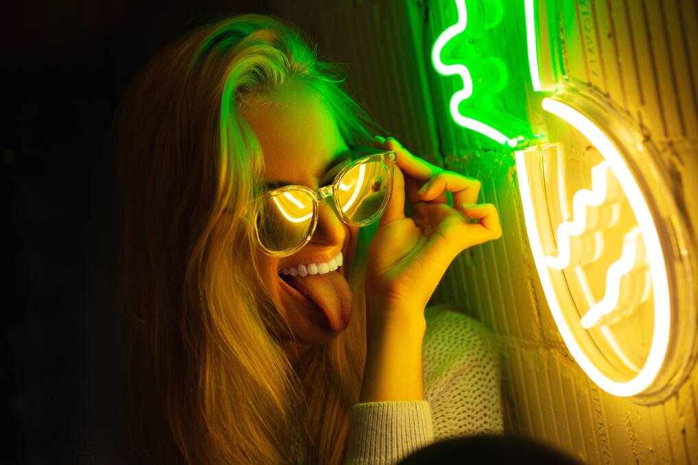 A FLASH OF NEON: Think bright lights, and fashion and accessories that are just as bold. Photo: Shutterstock
