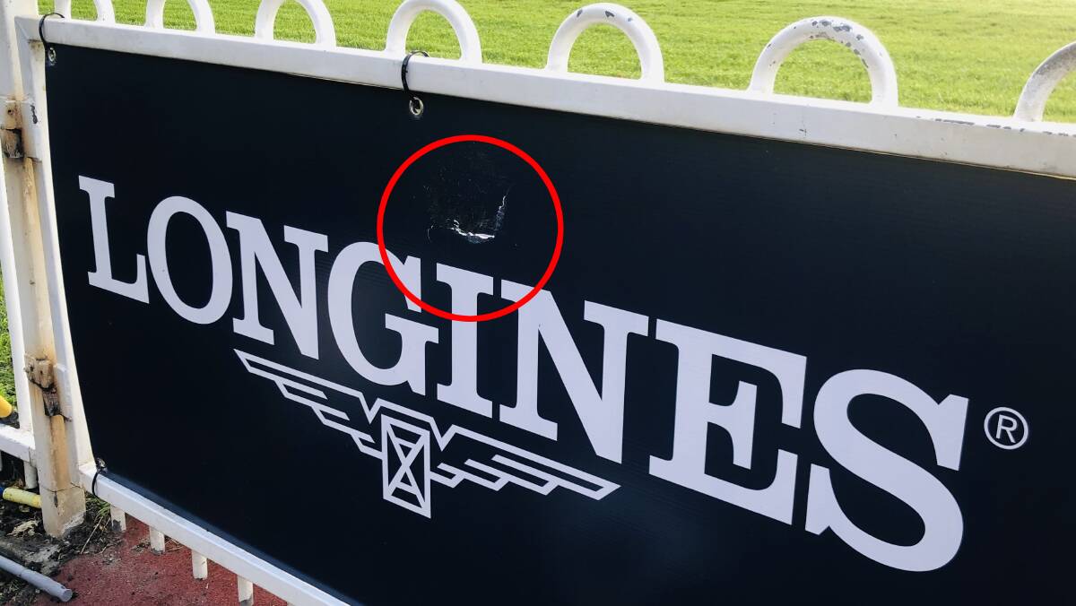The hole in the sign Winx left after she became agitated at a media call. She has been cleared to race on Saturday.