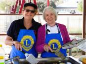 Lion Susie Davies and Lions Lady Laine Thiel were kept busy cooking up a storm at the Music on the Porch Day.