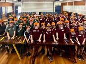 Combined schools marimba troupe meet up in the Parkes East Public School Hall for their first combined rehearsal on their marimbas.
