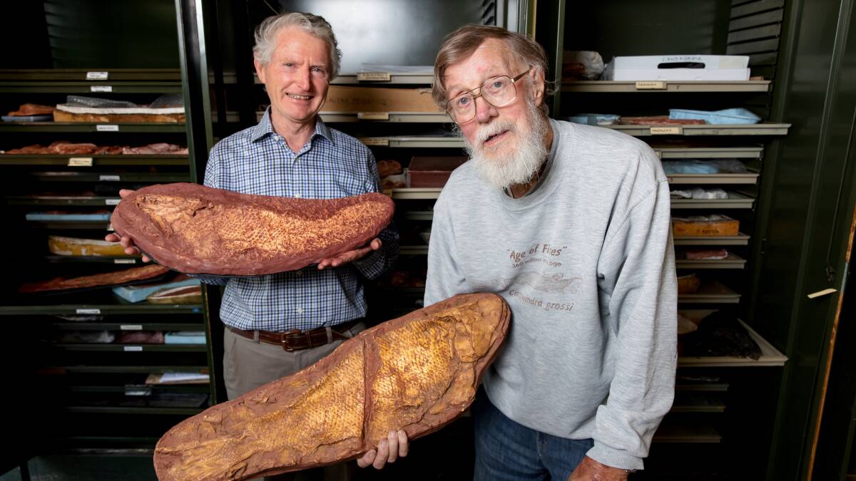 Dr David McGrath, right, bought land in Canowindra rich with fish fossils. Paleontologist Dr Alex Ritchie, left, unearthed the site in 1993. Picture: Sitthixay Ditthavong