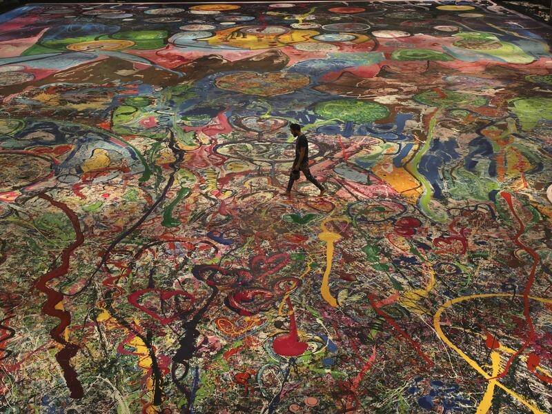 The Journey of Humanity by Sacha Jafri holds the Guinness World Record for the largest art canvas.