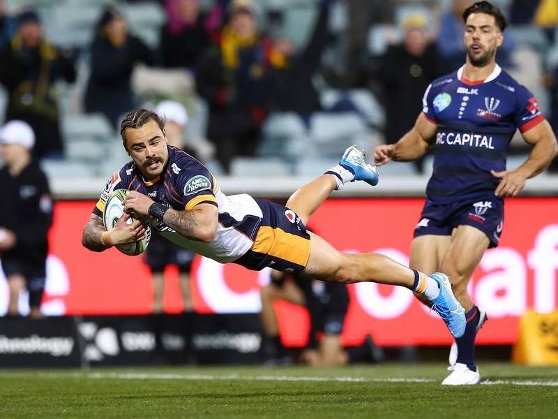 Andy Muirhead dives in to score a fine try in the Brumbies' 31-23 victory over the Rebels.