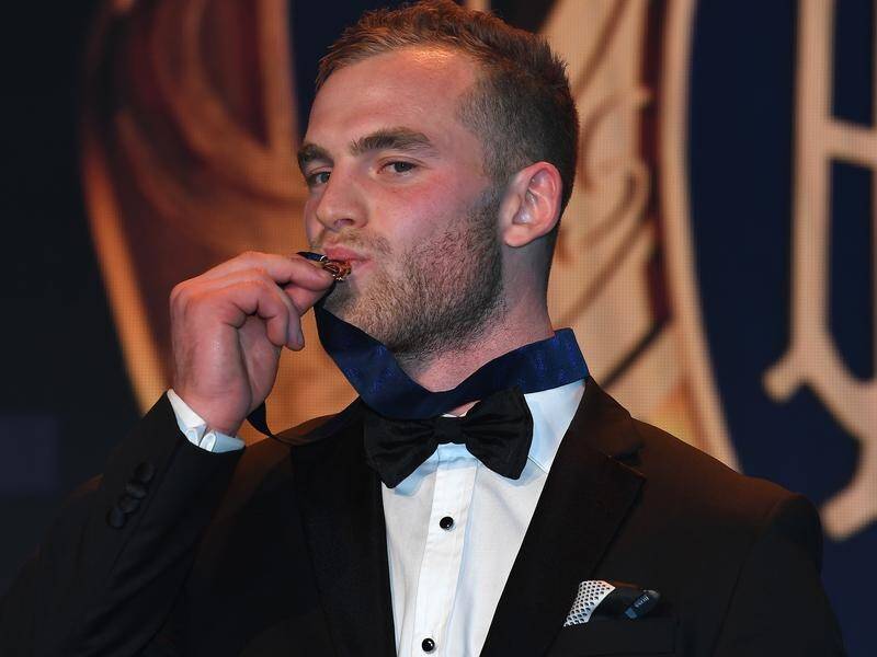 Brownlow medallist Tom Mitchell has added another two years to his AFL contract with the Hawks.