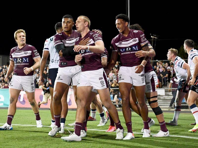 Tom Trbojevic (c) was back in dominant form as Manly thumped Sydney Roosters in their semi-final.