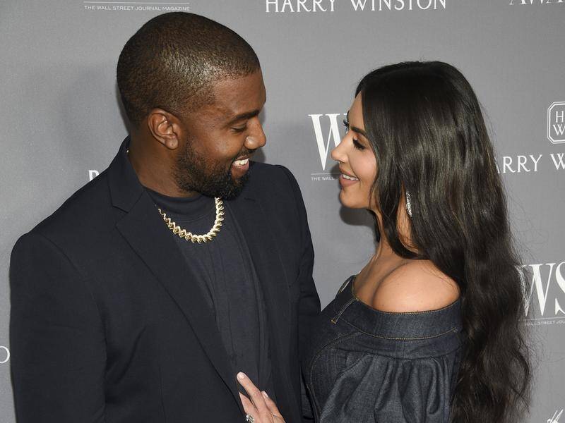 Kim Kardashian has not reacted to a tweet by Kanye West that he has been trying to divorce her.