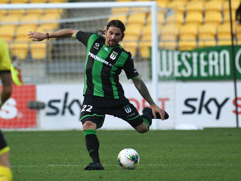 Ersan Gulum of Western United FC takes on the Phoenix during their round one A-League clash.