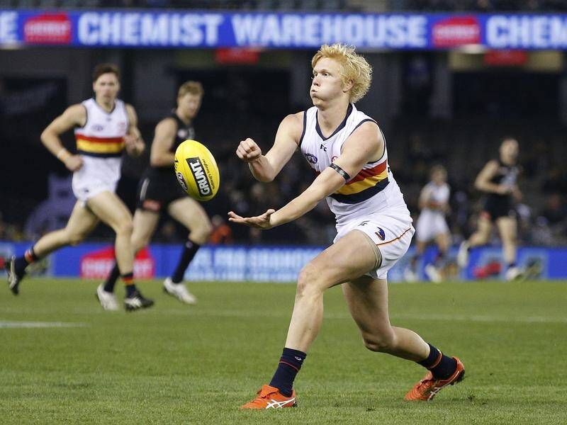 Adelaide have kept faith with Elliott Himmelberg for the Crows' AFL clash with West Coast.