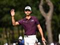 Local favourite Min Woo Lee is in the lead at the halfway point of the Australian Open. (Dan Himbrechts/AAP PHOTOS)