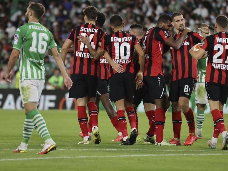 Real Betis and Bayer Leverkusen drew in the Europa League to move four points clear of Celtic.