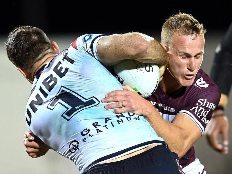Daly Cherry-Evans (r) scored a try in hometown Mackay as he led Manly to victory over the Roosters.