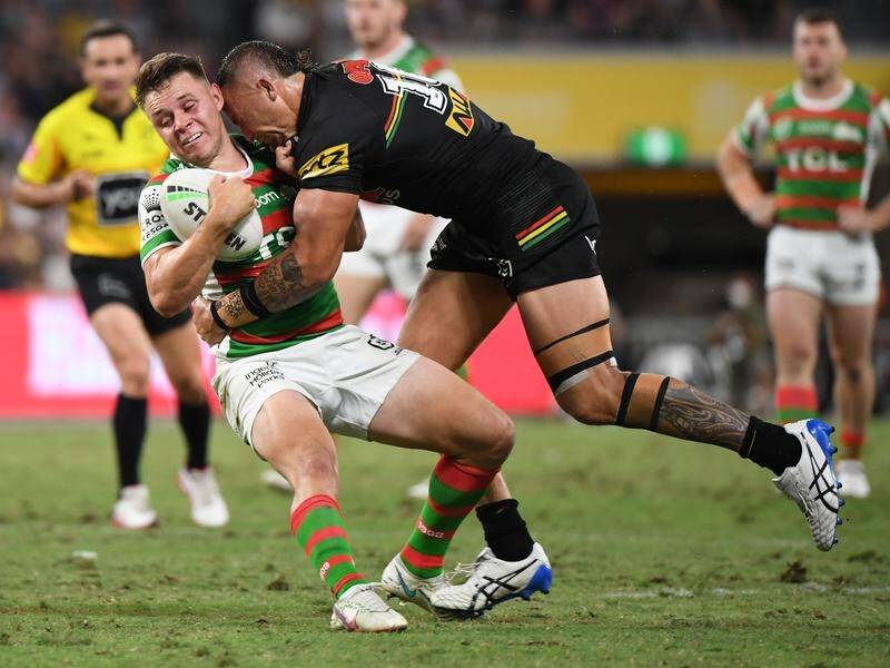 Rabbitohs' Blake Taaffe, tackled here by Panthers' James Fisher-Harris, had a storming game.