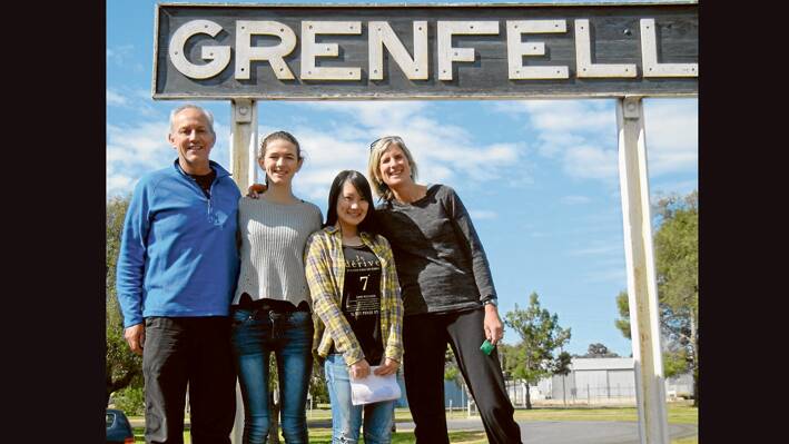 Steven, Esmee and Sanne Carroll with Mako Koyanagi  a Lions Exchange student from Japan at the Grenfell Railway Station on their weekend visit to Grenfell. 