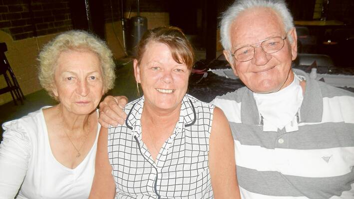 Kim Fanning (C) with her dad Len and Elva Fanning at her farewell dinner prior to her departure for work in the Northern Territory. 