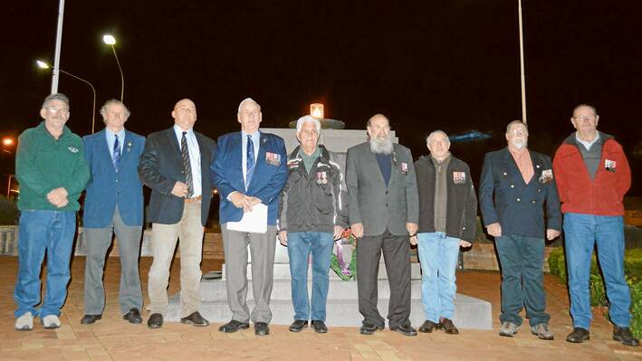 At the Long Tan Commemoration ceremony at the Grenfell Cenotaph on Monday evening were (l/r) Paul Mackinnon, Brian Hughes, Mark Liebich, Maurice Simpson,Terry Carroll, Rob Maxwell, Keith White, Bill White and Don Forsyth.  