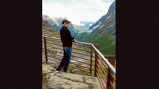 Justyn Armstrong taking in the magnificent view at Trollstigheimen, Norway on his recent overseas trip. (Photo contributed) 